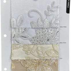 Claire Lace Table Linen in Champagne