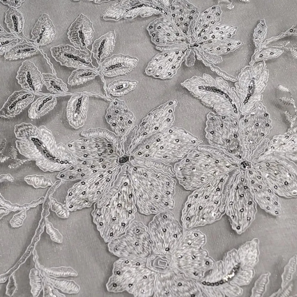 Claire Lace Table Linen in Silver and White