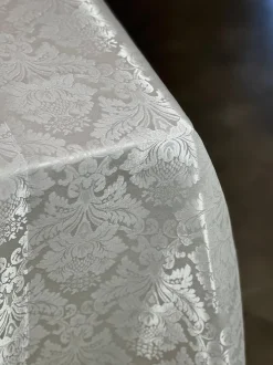 Damask Poly Table Linen in Ivory
