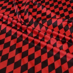 Harlequin Print (Lamour) Table Linen in Black and Red
