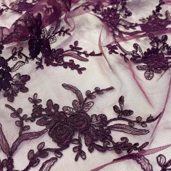 Laylani Lace Table Linen in Raisin