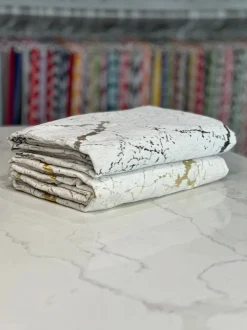 Marble Jacquard Table Linen in Gold