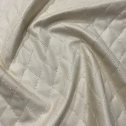 Murano Quilt Table Linen in Champagne