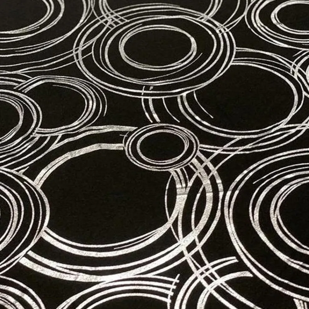 Orbit (Metallic Print) Table Linen in Black and Silver