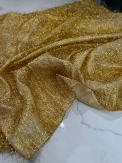 String Metallic Table Linen in Gold