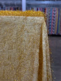 String Metallic Table Linen in Gold