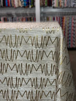 Zion Jacquard Table Linen in Gold