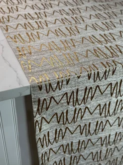 Zion Jacquard Table Linen in Gold