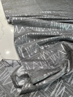 Zion Jacquard Table Linen in Silver